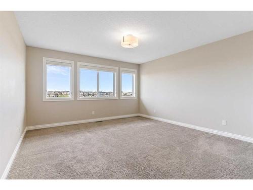 148 Marquis View Se, Calgary, AB - Indoor Photo Showing Living Room