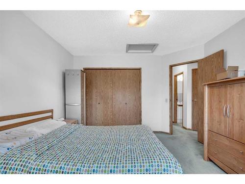 28 Martinwood Way Ne, Calgary, AB - Indoor Photo Showing Bedroom