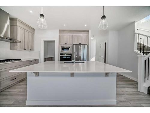 693 Creekmill Court Sw, Airdrie, AB - Indoor Photo Showing Kitchen With Stainless Steel Kitchen With Upgraded Kitchen