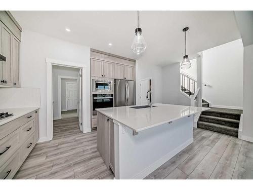 693 Creekmill Court Sw, Airdrie, AB - Indoor Photo Showing Kitchen With Stainless Steel Kitchen With Upgraded Kitchen