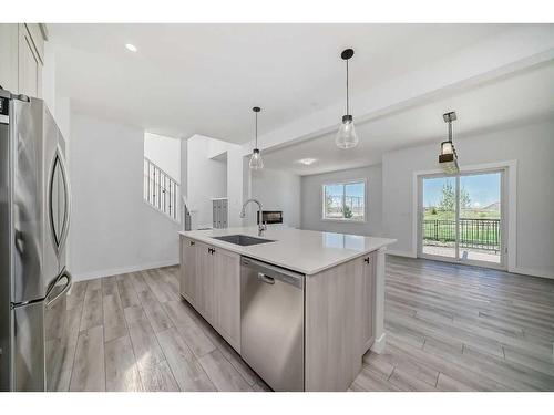 693 Creekmill Court Sw, Airdrie, AB - Indoor Photo Showing Kitchen With Stainless Steel Kitchen With Upgraded Kitchen