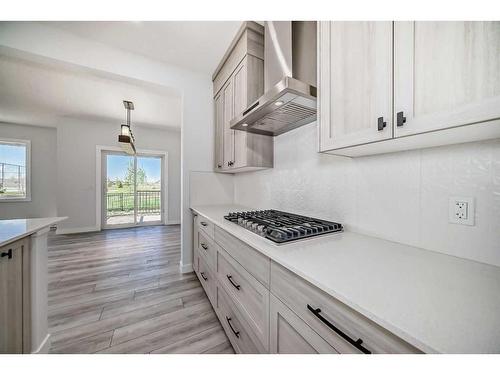 693 Creekmill Court Sw, Airdrie, AB - Indoor Photo Showing Kitchen With Upgraded Kitchen