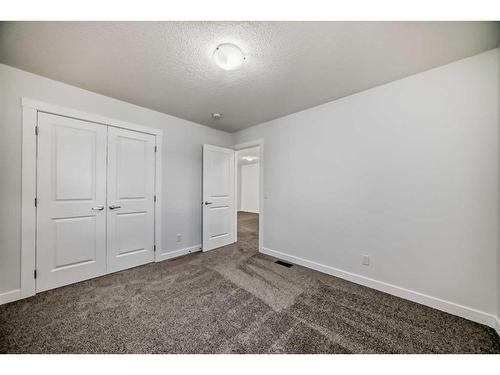 693 Creekmill Court Sw, Airdrie, AB - Indoor Photo Showing Other Room