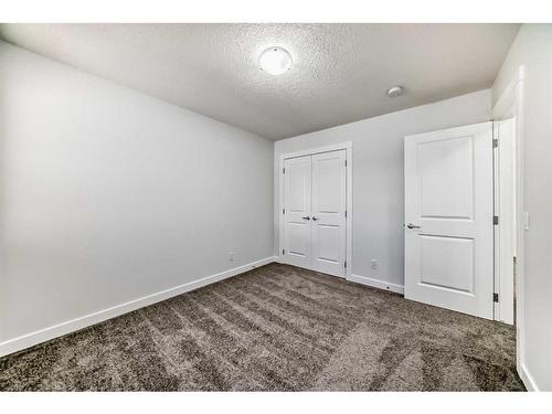 693 Creekmill Court Sw, Airdrie, AB - Indoor Photo Showing Other Room