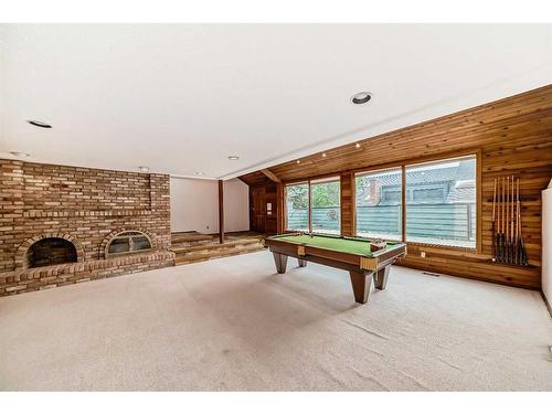 11-2200 Varsity Estates Drive Nw, Calgary, AB - Indoor Photo Showing Other Room With Fireplace