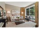 215 Douglasview Road Se, Calgary, AB  - Indoor Photo Showing Living Room 