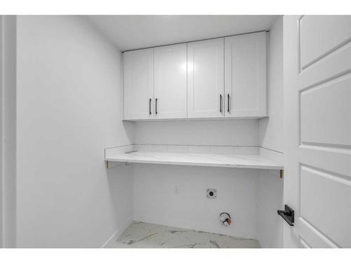 122 Baysprings Gardens, Airdrie, AB - Indoor Photo Showing Laundry Room