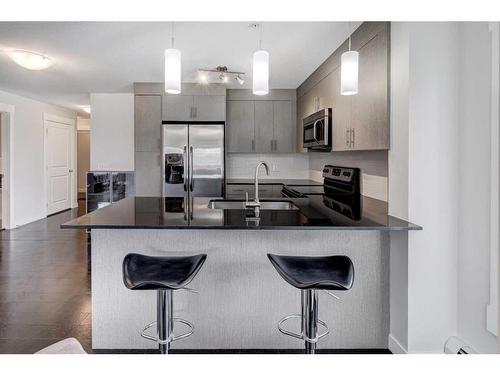 1308-240 Skyview Ranch Road Ne, Calgary, AB - Indoor Photo Showing Kitchen With Stainless Steel Kitchen With Upgraded Kitchen