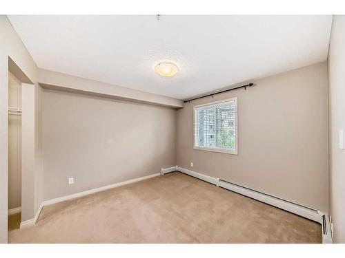 2317-130 Panatella Street Nw, Calgary, AB - Indoor Photo Showing Other Room