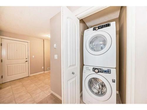 2317-130 Panatella Street Nw, Calgary, AB - Indoor Photo Showing Laundry Room