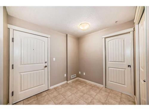 2317-130 Panatella Street Nw, Calgary, AB - Indoor Photo Showing Other Room