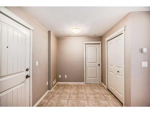 2317-130 Panatella Street Nw, Calgary, AB - Indoor Photo Showing Other Room