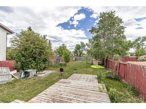 21 Castleglen Road Ne, Calgary, AB - Outdoor With Deck Patio Veranda With Backyard