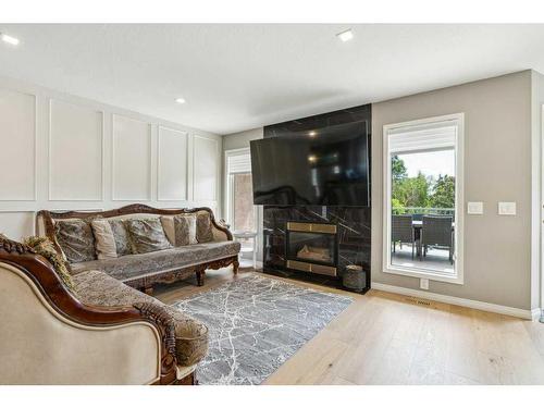 850 37 Street Nw, Calgary, AB - Indoor Photo Showing Living Room With Fireplace