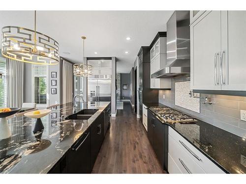 237 Silverado Ranch Manor Sw, Calgary, AB - Indoor Photo Showing Kitchen With Stainless Steel Kitchen With Double Sink With Upgraded Kitchen