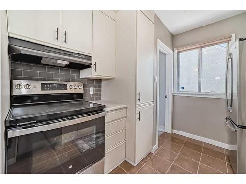 11419 111A Avenue Nw, Edmonton, AB - Indoor Photo Showing Kitchen With Stainless Steel Kitchen