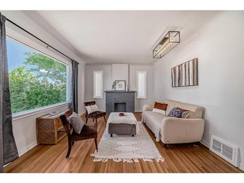 11419 111A Avenue Nw, Edmonton, AB - Indoor Photo Showing Living Room With Fireplace