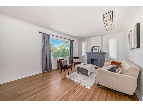 11419 111A Avenue Nw, Edmonton, AB - Indoor Photo Showing Living Room With Fireplace