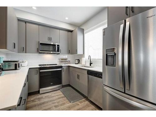 506-850 Belmont Drive Sw, Calgary, AB - Indoor Photo Showing Kitchen With Stainless Steel Kitchen With Upgraded Kitchen