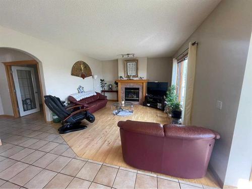 75 Hampstead Way Nw, Calgary, AB - Indoor Photo Showing Living Room With Fireplace