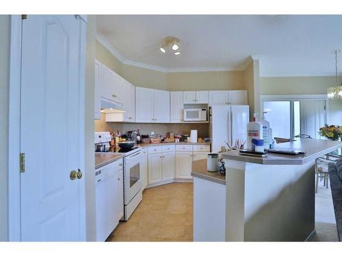 87 Edgeridge Terrace Nw, Calgary, AB - Indoor Photo Showing Kitchen