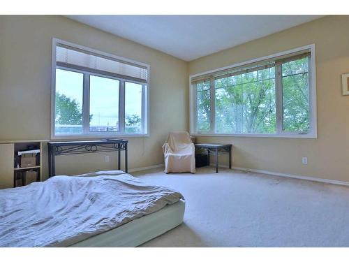 87 Edgeridge Terrace Nw, Calgary, AB - Indoor Photo Showing Bedroom