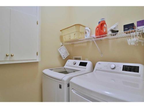 87 Edgeridge Terrace Nw, Calgary, AB - Indoor Photo Showing Laundry Room