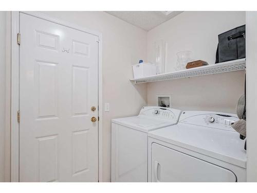 112 Somerset Circle Sw, Calgary, AB - Indoor Photo Showing Laundry Room