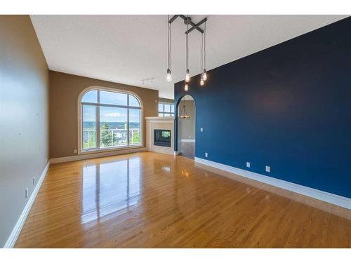 202 Patterson Boulevard Sw, Calgary, AB - Indoor Photo Showing Other Room With Fireplace