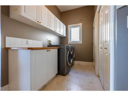 202 Patterson Boulevard Sw, Calgary, AB - Indoor Photo Showing Laundry Room