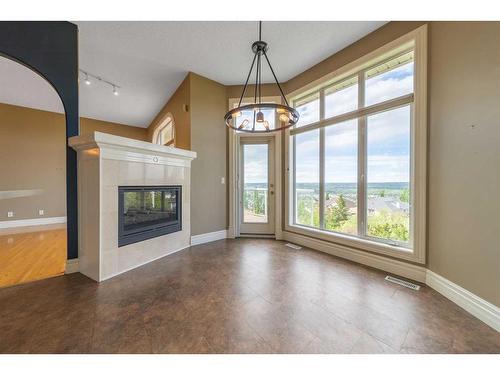 202 Patterson Boulevard Sw, Calgary, AB - Indoor With Fireplace