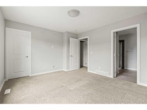 106 Magnolia Square Se, Calgary, AB - Indoor Photo Showing Other Room