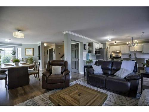 201 Riverwood Close Se, Calgary, AB - Indoor Photo Showing Living Room
