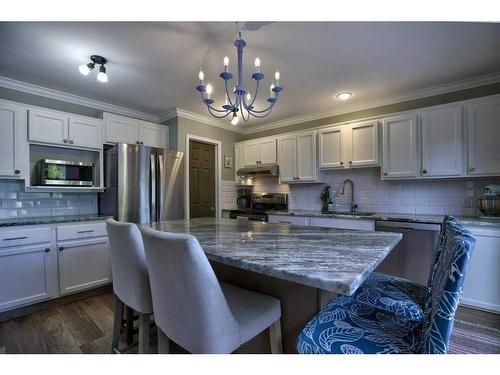 201 Riverwood Close Se, Calgary, AB - Indoor Photo Showing Kitchen With Stainless Steel Kitchen