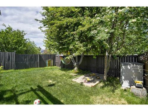 201 Riverwood Close Se, Calgary, AB - Outdoor With Backyard