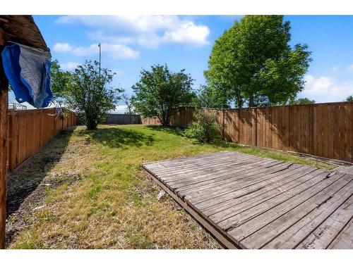 69 Castleglen Road Ne, Calgary, AB - Outdoor With Deck Patio Veranda With Backyard