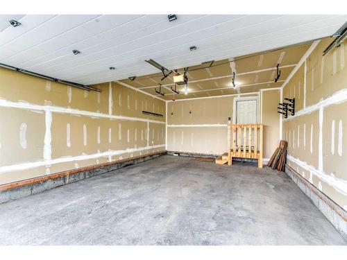 1217 Copperfield Boulevard Se, Calgary, AB - Indoor Photo Showing Garage