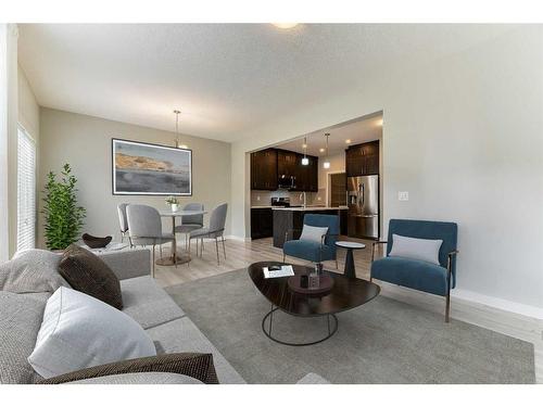 1217 Copperfield Boulevard Se, Calgary, AB - Indoor Photo Showing Living Room