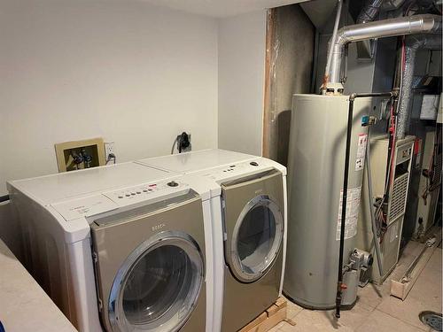 183 Christie Park Hill Sw, Calgary, AB - Indoor Photo Showing Laundry Room