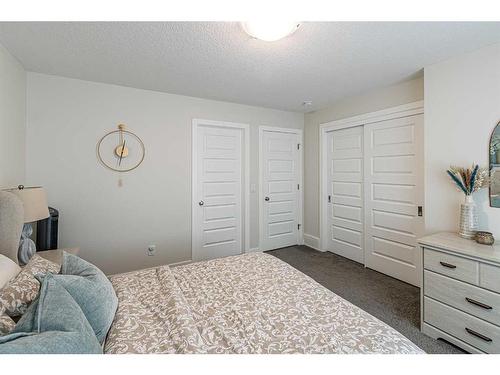 67 Wolf Creek Drive Se, Calgary, AB - Indoor Photo Showing Bedroom