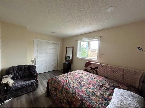 9 Erin Grove Court Se, Calgary, AB - Indoor Photo Showing Bedroom