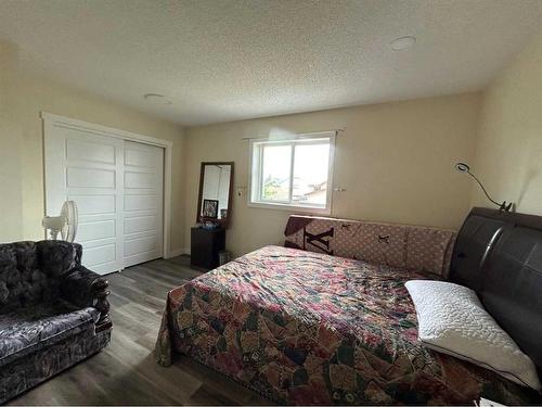 9 Erin Grove Court Se, Calgary, AB - Indoor Photo Showing Bedroom