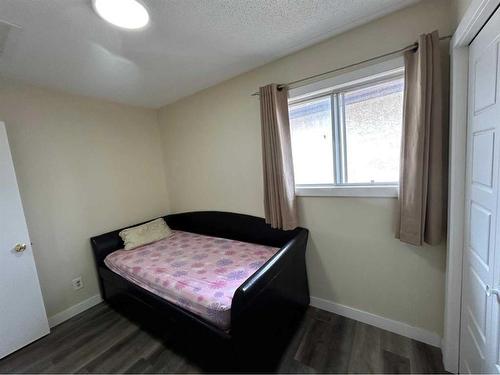 9 Erin Grove Court Se, Calgary, AB - Indoor Photo Showing Bedroom