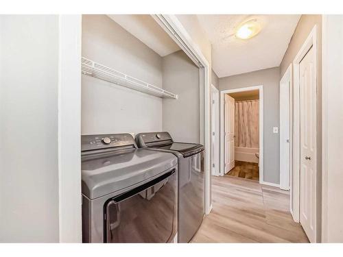 808 Luxstone Square Sw, Airdrie, AB - Indoor Photo Showing Laundry Room