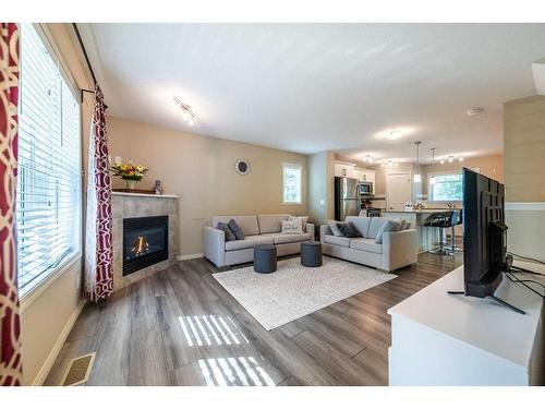 429 Cranberry Park Se, Calgary, AB - Indoor Photo Showing Living Room With Fireplace