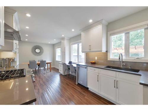 19 Garrick Drive Sw, Calgary, AB - Indoor Photo Showing Kitchen With Upgraded Kitchen