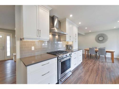 19 Garrick Drive Sw, Calgary, AB - Indoor Photo Showing Kitchen With Upgraded Kitchen