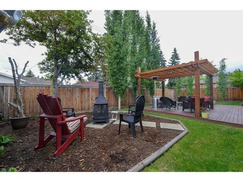 19 Garrick Drive Sw, Calgary, AB - Outdoor With Deck Patio Veranda With Backyard