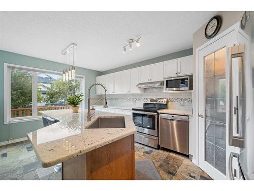 129 Schooner Close Nw, Calgary, AB - Indoor Photo Showing Kitchen With Upgraded Kitchen