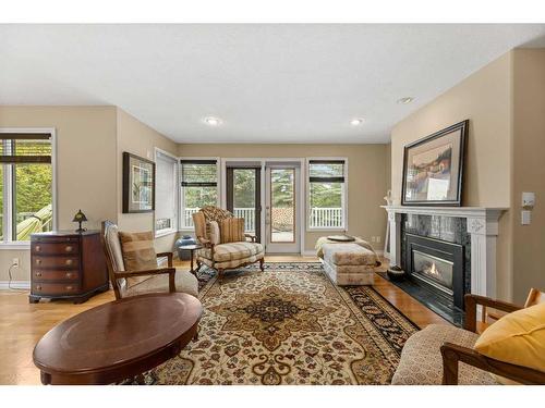 16-31222 Rge Rd 20A, Rural Mountain View County, AB - Indoor Photo Showing Living Room With Fireplace